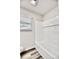 Bright bathroom featuring a tiled shower-tub, window, and hardwood floors at 1232 Hawthorne Cir, Hanahan, SC 29410