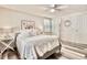 Bedroom with a ceiling fan, stylish decor, and a full sized bed in a cozy, and updated living space at 1232 Hawthorne Cir, Hanahan, SC 29410