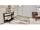 Welcoming entryway showcasing wood-look floors, a decorative table, and ample natural light at 1232 Hawthorne Cir, Hanahan, SC 29410