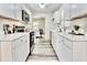 Modern kitchen with sleek stainless steel appliances and quartz countertops at 1232 Hawthorne Cir, Hanahan, SC 29410