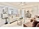 Stylishly furnished living room boasts an open layout and lots of natural light at 1232 Hawthorne Cir, Hanahan, SC 29410