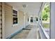 Spacious covered porch featuring classic railing offering space for relaxing outdoors at 1232 Hawthorne Cir, Hanahan, SC 29410