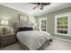 Comfortable bedroom with ceiling fan, neutral tones, and natural light at 1260 Old Whitesville Rd, Moncks Corner, SC 29461