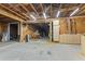 Interior of garage with exposed wood frame, lighting, and tools, perfect for handyman projects at 1260 Old Whitesville Rd, Moncks Corner, SC 29461