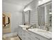 Stylish bathroom with dual sinks, marble countertops, and modern fixtures at 127 Beresford Creek St, Daniel Island, SC 29492