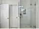 Elegant bathroom with a glass shower enclosure and modern fixtures at 127 Beresford Creek St, Daniel Island, SC 29492