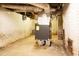 Utility area in basement with exposed ducts and brick foundation at 1316 Wichman St, Walterboro, SC 29488