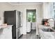 Kitchen featuring stainless steel appliances and a view into the laundry room at 1316 Wichman St, Walterboro, SC 29488