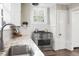 Bright kitchen featuring stainless steel appliances, granite counters, and subway tile backsplash at 1316 Wichman St, Walterboro, SC 29488