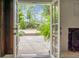 Patio view showcasing outdoor space with trees and plants at 1316 Wichman St, Walterboro, SC 29488