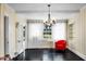 Sitting room featuring bright curtains and a shiny floor at 1316 Wichman St, Walterboro, SC 29488