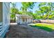 View of backyard featuring a detached structure with a covered porch perfect for outdoor relaxation and entertainment at 1430 Hindman Ave, Mount Pleasant, SC 29464