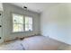 Bedroom with hardwood floors, natural light and unfinished wood trim at 1430 Hindman Ave, Mount Pleasant, SC 29464