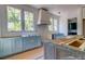 Bright kitchen with natural light and cabinets awaiting final installation at 1430 Hindman Ave, Mount Pleasant, SC 29464