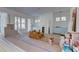 Spacious living room with fireplace and large windows, currently under construction at 1430 Hindman Ave, Mount Pleasant, SC 29464