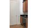 Convenient wet bar features granite countertop, under counter refrigerator, and custom cabinetry at 1505 Rivertowne Country Club Dr, Mount Pleasant, SC 29466