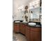 Spacious bathroom with double vanities, decorative mirrors, and stylish accents at 1505 Rivertowne Country Club Dr, Mount Pleasant, SC 29466