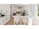 Bright, modern kitchen with stainless steel appliances, island seating and abundant cabinet space at 1505 Rivertowne Country Club Dr, Mount Pleasant, SC 29466