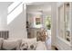 Bright kitchen featuring an island with bar seating and white cabinets offers a stylish gathering space at 1505 Rivertowne Country Club Dr, Mount Pleasant, SC 29466