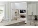 Open concept living space with a fireplace, built-in shelving, and a comfortable seating area at 1505 Rivertowne Country Club Dr, Mount Pleasant, SC 29466