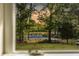 Scenic view of a golf course and tranquil pond from a window, showing serene outdoors at 1505 Rivertowne Country Club Dr, Mount Pleasant, SC 29466