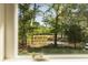 Scenic outdoor view features lush greenery, pond, and golf course through a window at 1505 Rivertowne Country Club Dr, Mount Pleasant, SC 29466