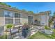 Backyard patio area with outdoor seating and lush landscaping at 1507 Blaze Ln, Charleston, SC 29412