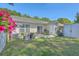 Backyard showcasing a well-maintained lawn, patio area, and ample space at 1507 Blaze Ln, Charleston, SC 29412