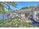 Backyard featuring a grassy yard, patio area, and surrounding fence at 1507 Blaze Ln, Charleston, SC 29412