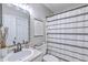 Updated bathroom with a modern vanity, gray walls, and a decorative shower curtain at 1507 Blaze Ln, Charleston, SC 29412
