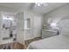Bedroom showcasing ensuite bathroom and white furniture at 1507 Blaze Ln, Charleston, SC 29412