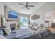 Bright living room featuring a fireplace, cozy seating, and sliding glass doors that offer a view to the outside at 1507 Blaze Ln, Charleston, SC 29412