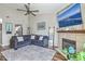 Inviting living room with a fireplace, plush seating, and modern decor at 1507 Blaze Ln, Charleston, SC 29412
