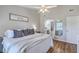 Serene main bedroom with a view into the bathroom and featuring a large bed at 1507 Blaze Ln, Charleston, SC 29412