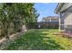 Well-kept backyard with a wooden fence and mature trees, offering a serene and private outdoor space at 157 Townsend Way, Summerville, SC 29483