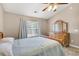Cozy bedroom with a ceiling fan and a window that provides plenty of natural light at 157 Townsend Way, Summerville, SC 29483