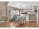 Open-concept dining area with hardwood floors and view of the kitchen at 157 Townsend Way, Summerville, SC 29483