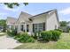 Single-story home with neat landscaping, featuring decorative shutters and well-kept lawn at 157 Townsend Way, Summerville, SC 29483