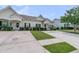 Well-kept single story house featuring a spacious driveway and manicured landscaping at 157 Townsend Way, Summerville, SC 29483