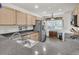 Well lit kitchen showcasing granite countertops, stainless steel appliances, and plenty of cabinet space at 157 Townsend Way, Summerville, SC 29483