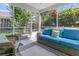 Relaxing screened-in porch with comfortable seating, a ceiling fan, and views of the backyard at 157 Townsend Way, Summerville, SC 29483