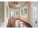 Bedroom with hardwood floors, windows, and wood ceiling at 17 Wentworth St, Charleston, SC 29401