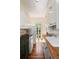 Galley kitchen with butcher block countertops and white appliances at 17 Wentworth St, Charleston, SC 29401