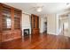Spacious living room features hardwood floors, fireplace and built in wooden cabinets at 17 Wentworth St, Charleston, SC 29401