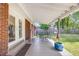 Covered patio with outdoor seating, a view of the backyard, and access to the home at 1821 Wasp St, North Charleston, SC 29405