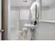 Modern bathroom featuring a white vanity, large mirror, and glass shower enclosure at 1821 Wasp St, North Charleston, SC 29405