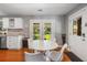 Bright dining area with access to the backyard, featuring a modern table at 1821 Wasp St, North Charleston, SC 29405