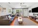Stylish living room with hardwood floors, a ceiling fan, and modern decor at 1821 Wasp St, North Charleston, SC 29405