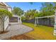 Fenced backyard featuring a swing set, patio, and a screened in porch at 2 Pagett St, Daniel Island, SC 29492