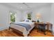 Bedroom with hardwood floors, a study desk and large windows at 2 Pagett St, Daniel Island, SC 29492